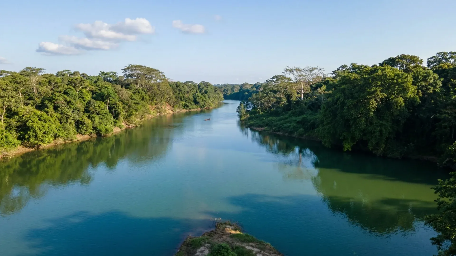 A tranquil riverfront property along one of Belize's lush inland waterways
